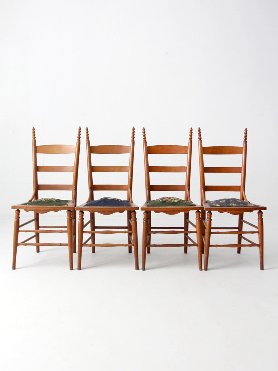 set of four Victorian ladder-back chairs with antique needlepoint seats