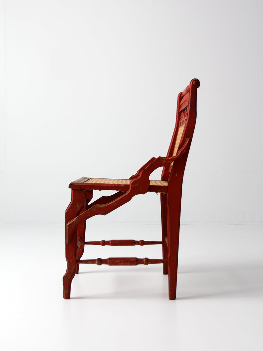 antique red painted cane cottage chair