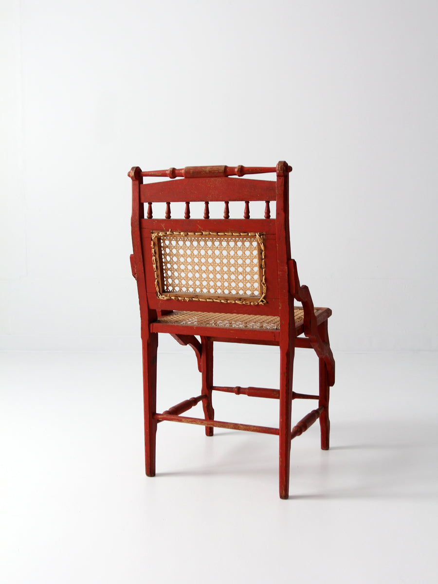 antique red painted cane cottage chair