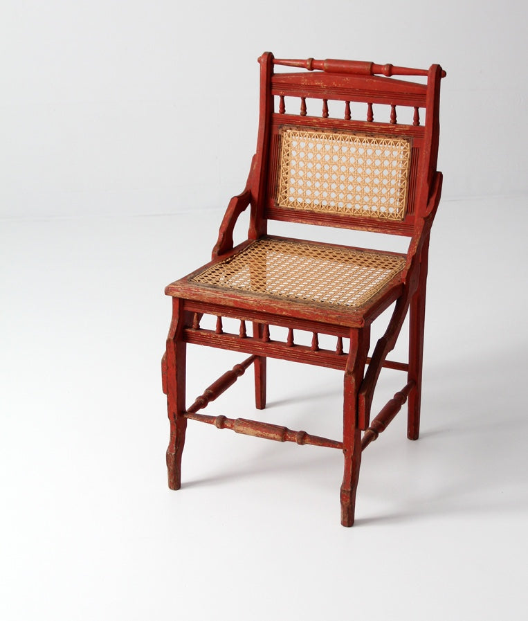 antique red painted cane cottage chair