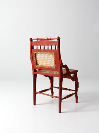antique red painted cane cottage chair