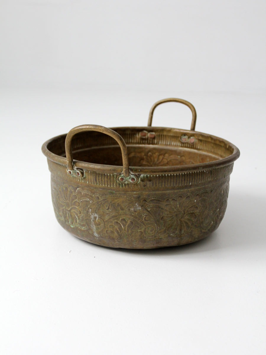 antique embossed brass basin with floral decoration