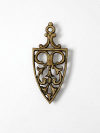 mid-century brass trivet