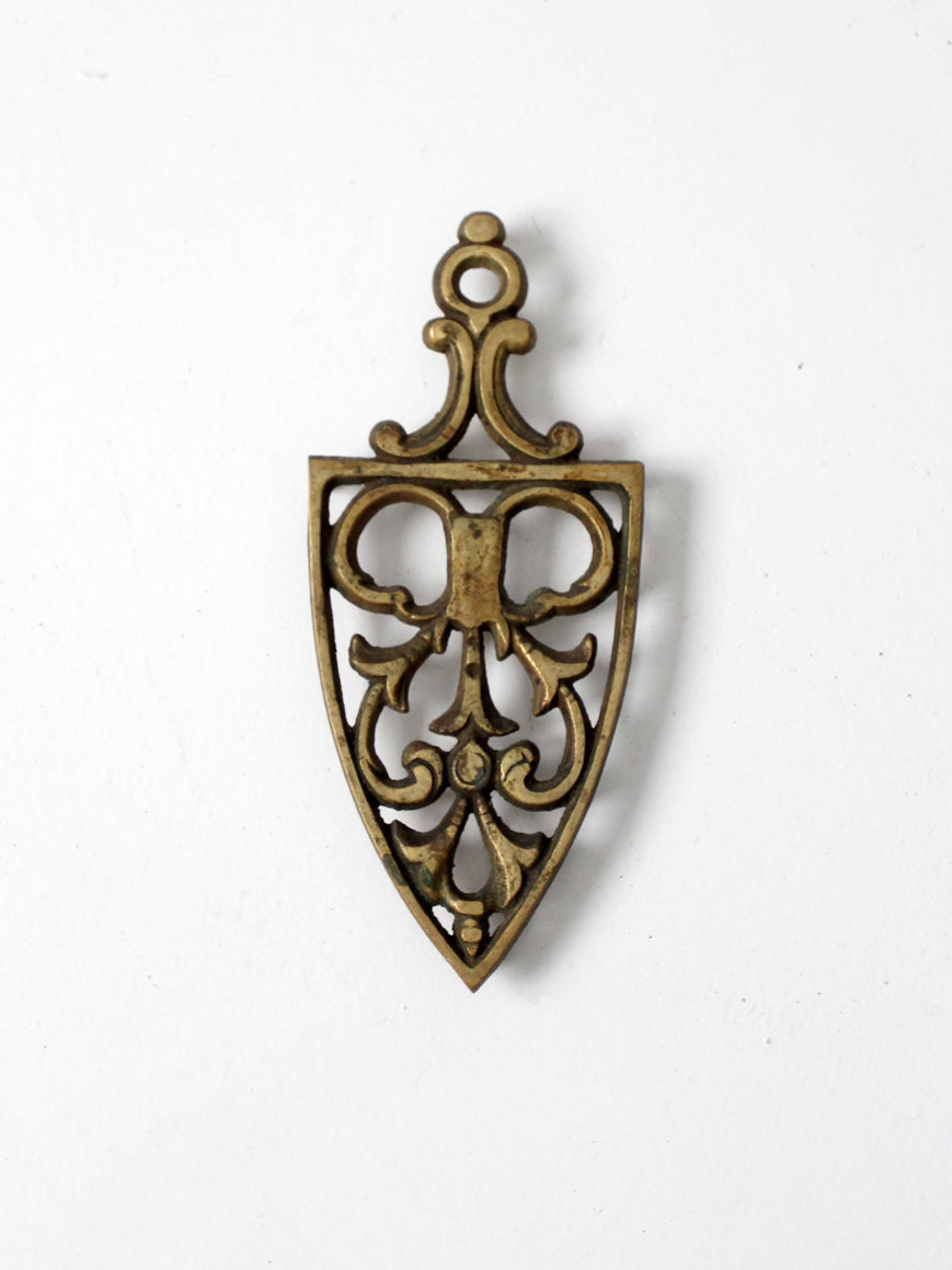 mid-century brass trivet