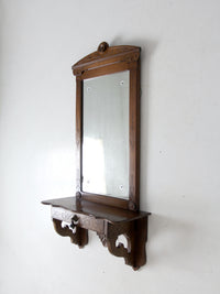 antique Victorian mirror with wall shelf