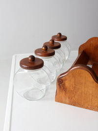vintage Anchor Hocking glass jars with wood stand