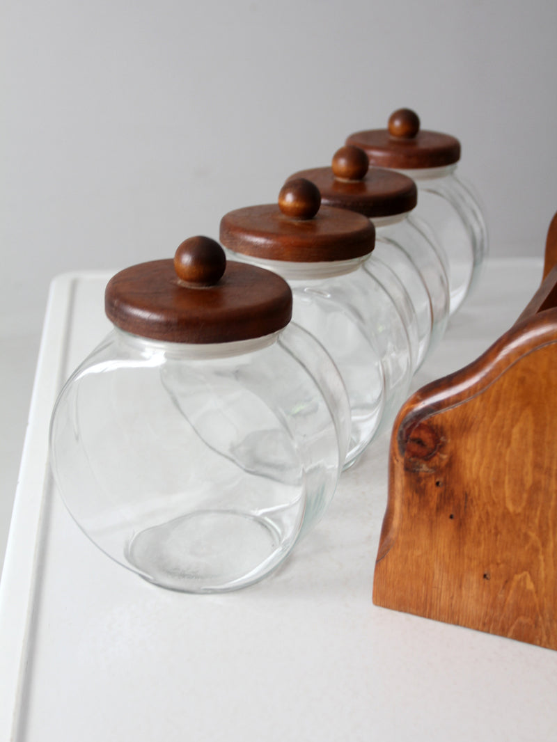 vintage Anchor Hocking glass jars with wood stand