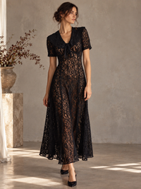 1970s black lace dress with oversized collar and bow