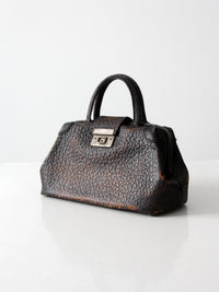 antique black leather top handle handbag