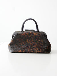 antique black leather top handle handbag