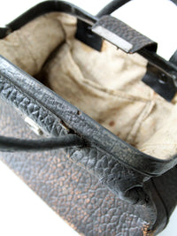 antique black leather top handle handbag