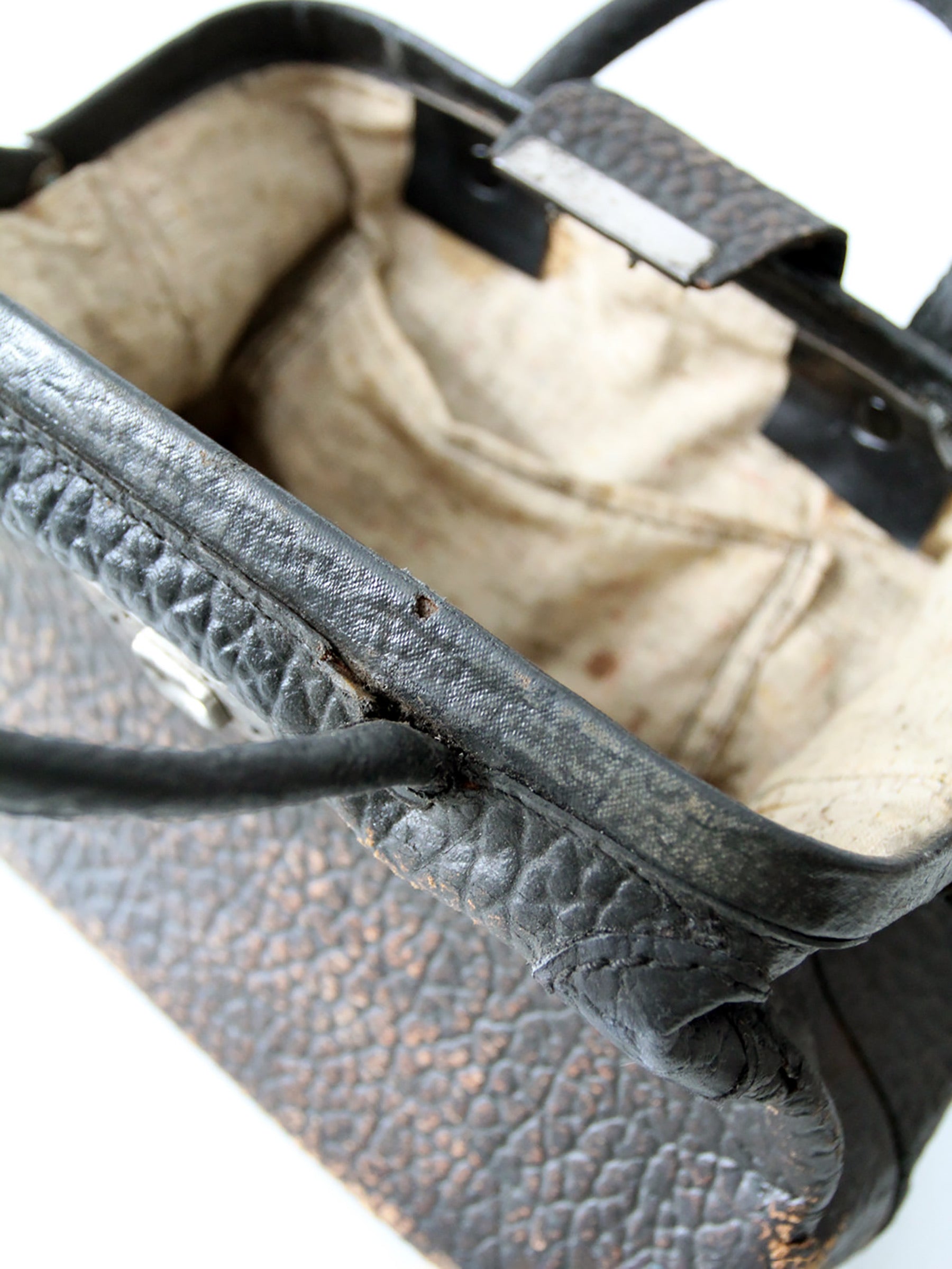 antique black leather top handle handbag