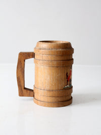 vintage wooden tankard with painted tavern scene