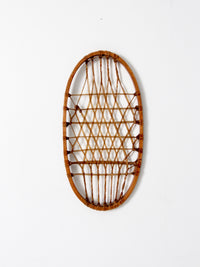 1940s Lund wooden snowshoe with rawhide webbing