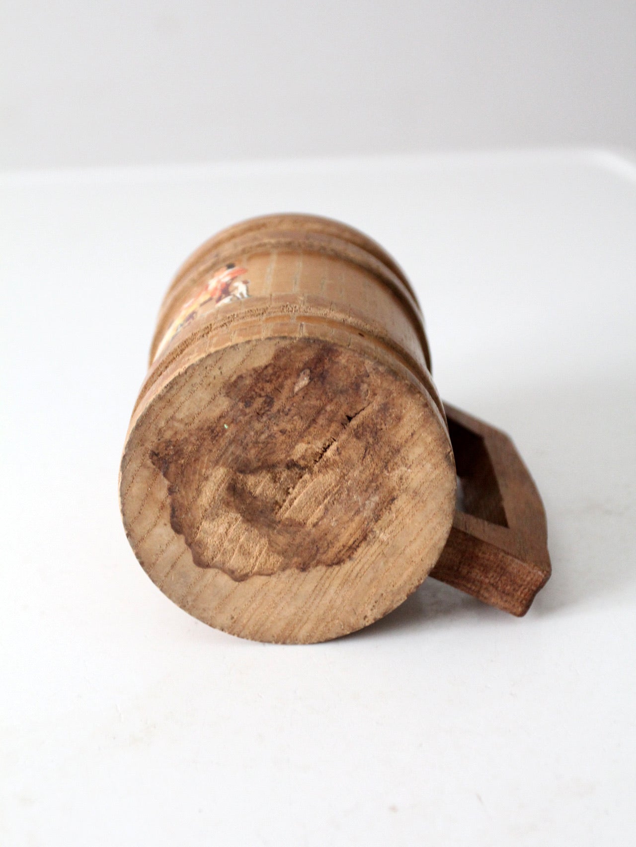 vintage wooden tankard with painted tavern scene