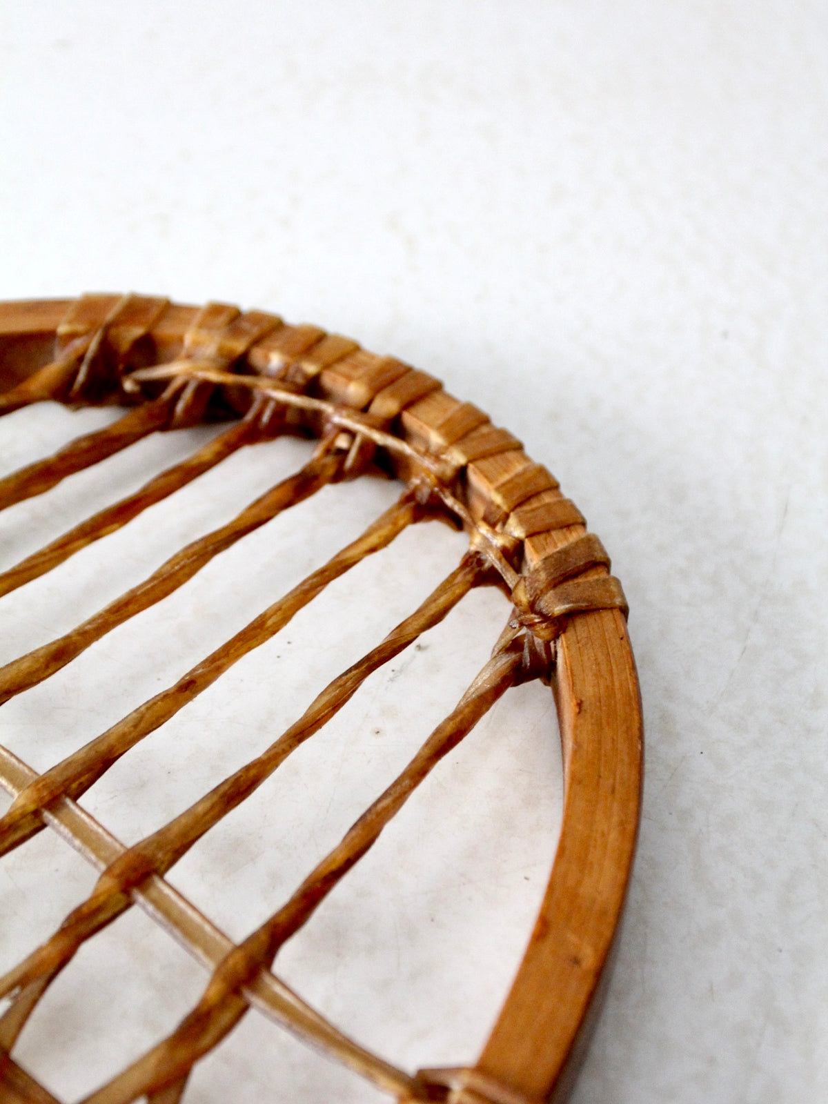 1940s Lund wooden snowshoe with rawhide webbing