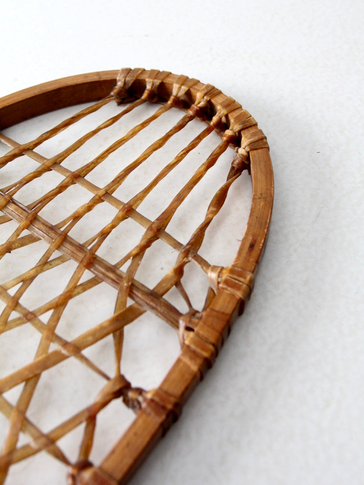 1940s Lund wooden snowshoe with rawhide webbing