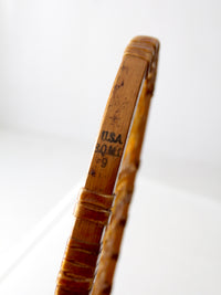 1940s Lund wooden snowshoe with rawhide webbing