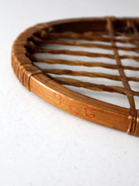 1940s Lund wooden snowshoe with rawhide webbing