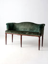 antique Neoclassical settee with velvet upholstery