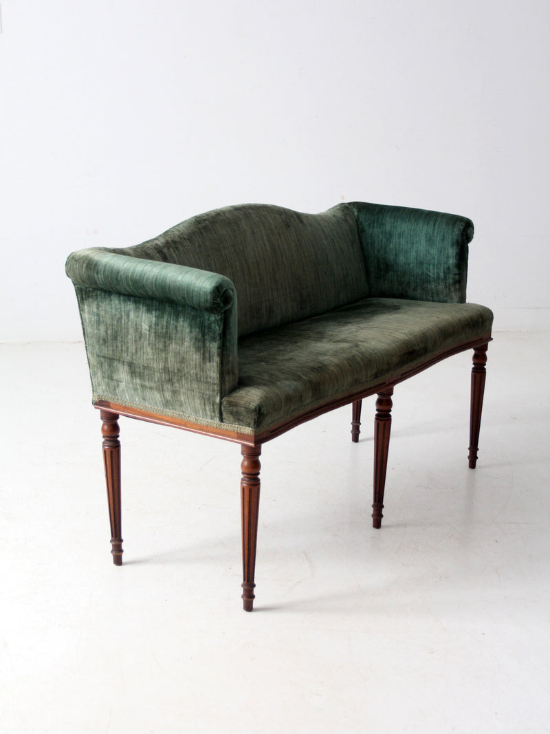 antique Neoclassical settee with velvet upholstery