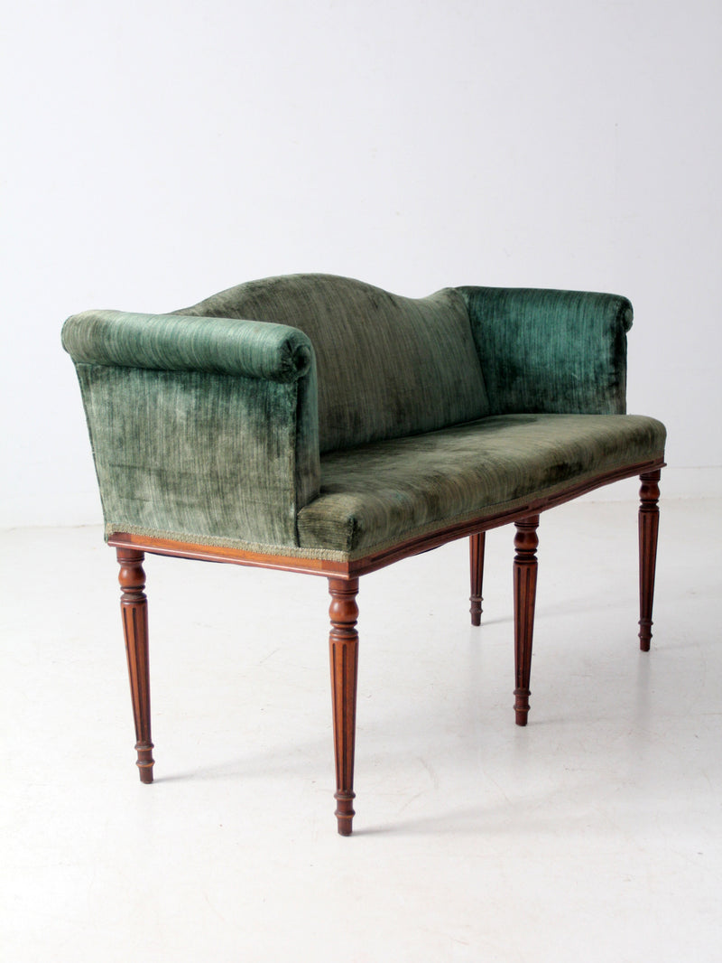 antique Neoclassical settee with velvet upholstery