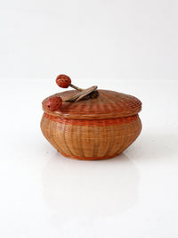 mid-century Chinese woven lidded basket with berry finial