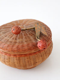 mid-century Chinese woven lidded basket with berry finial
