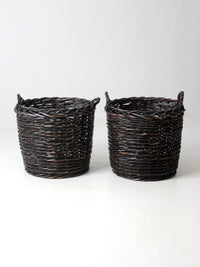 vintage black woven cane baskets pair