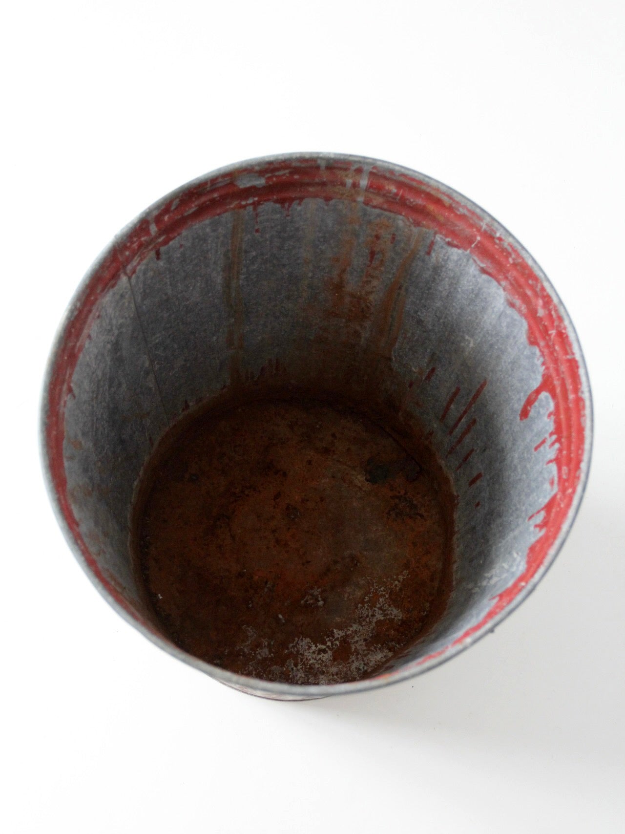 early 20th century red painted galvanized utility can