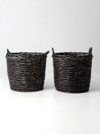 vintage black woven cane baskets pair