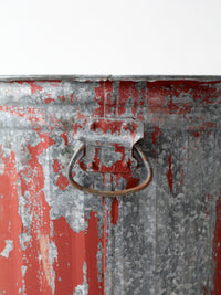early 20th century red painted galvanized utility can