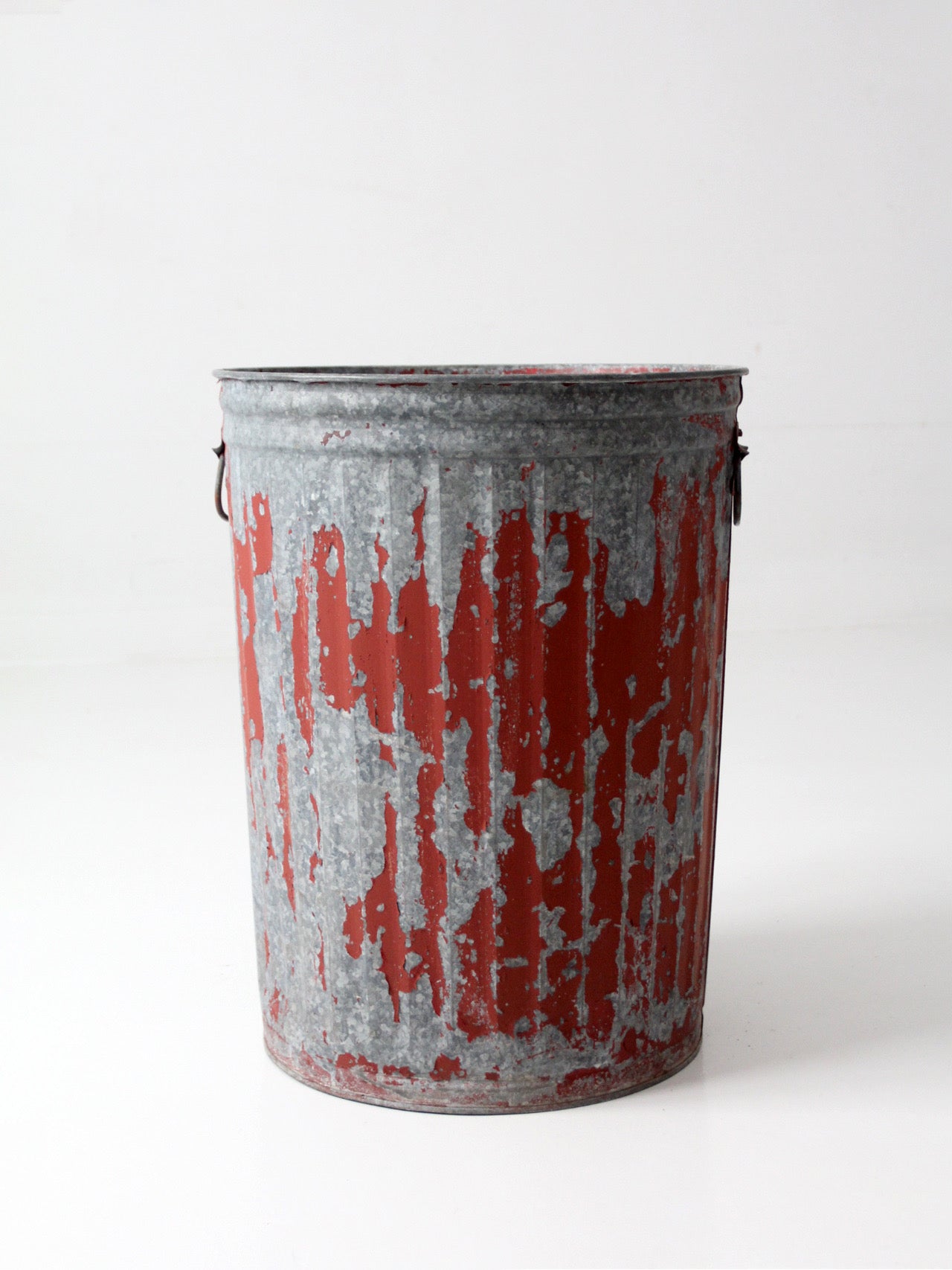 early 20th century red painted galvanized utility can