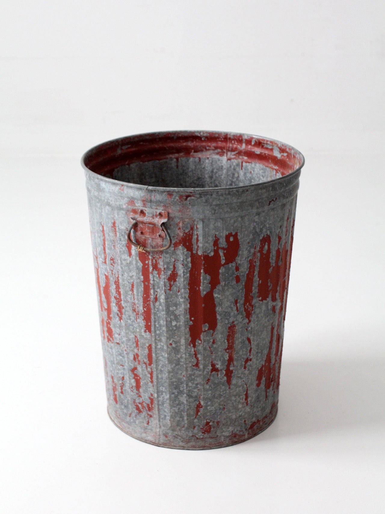 early 20th century red painted galvanized utility can