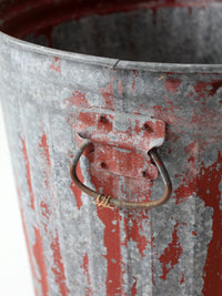 early 20th century red painted galvanized utility can