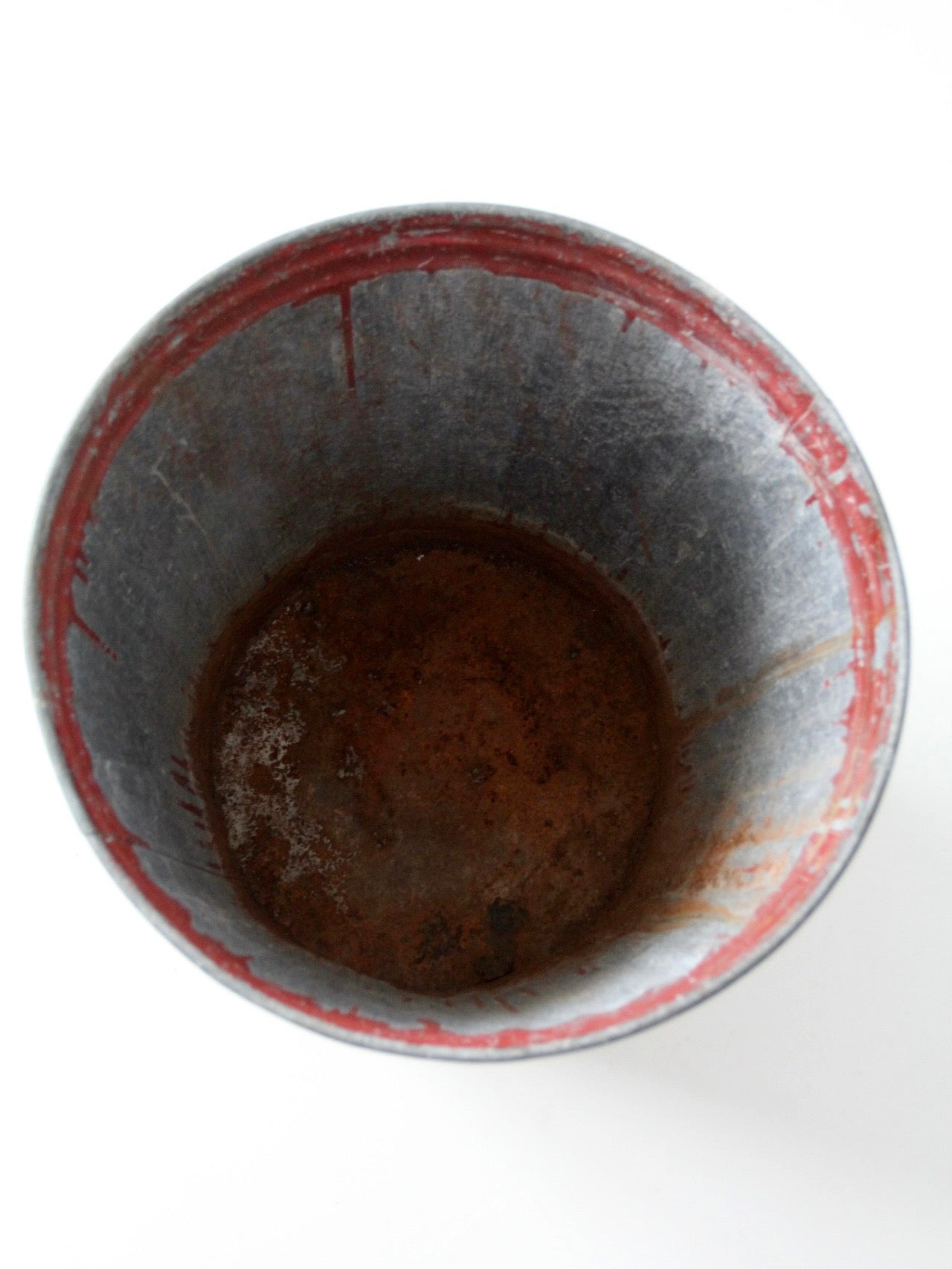 early 20th century red painted galvanized utility can