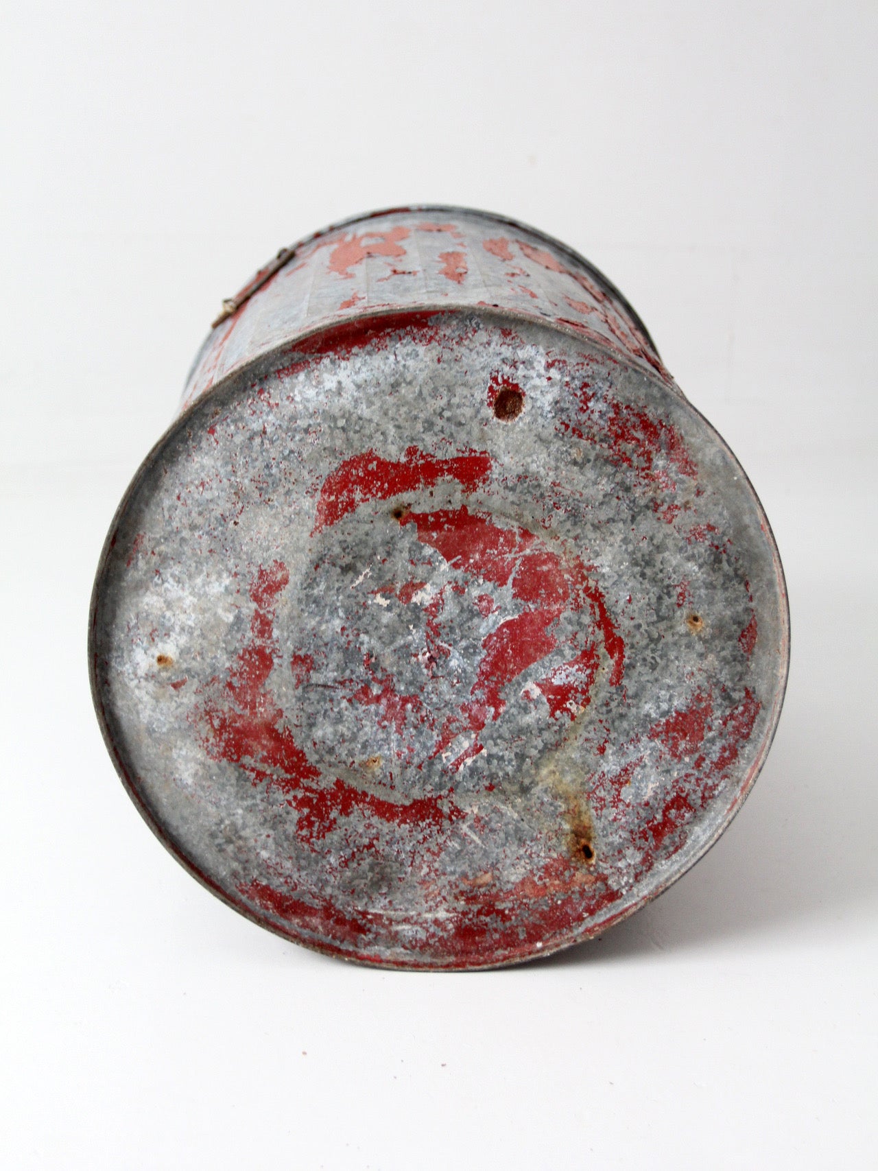 early 20th century red painted galvanized utility can