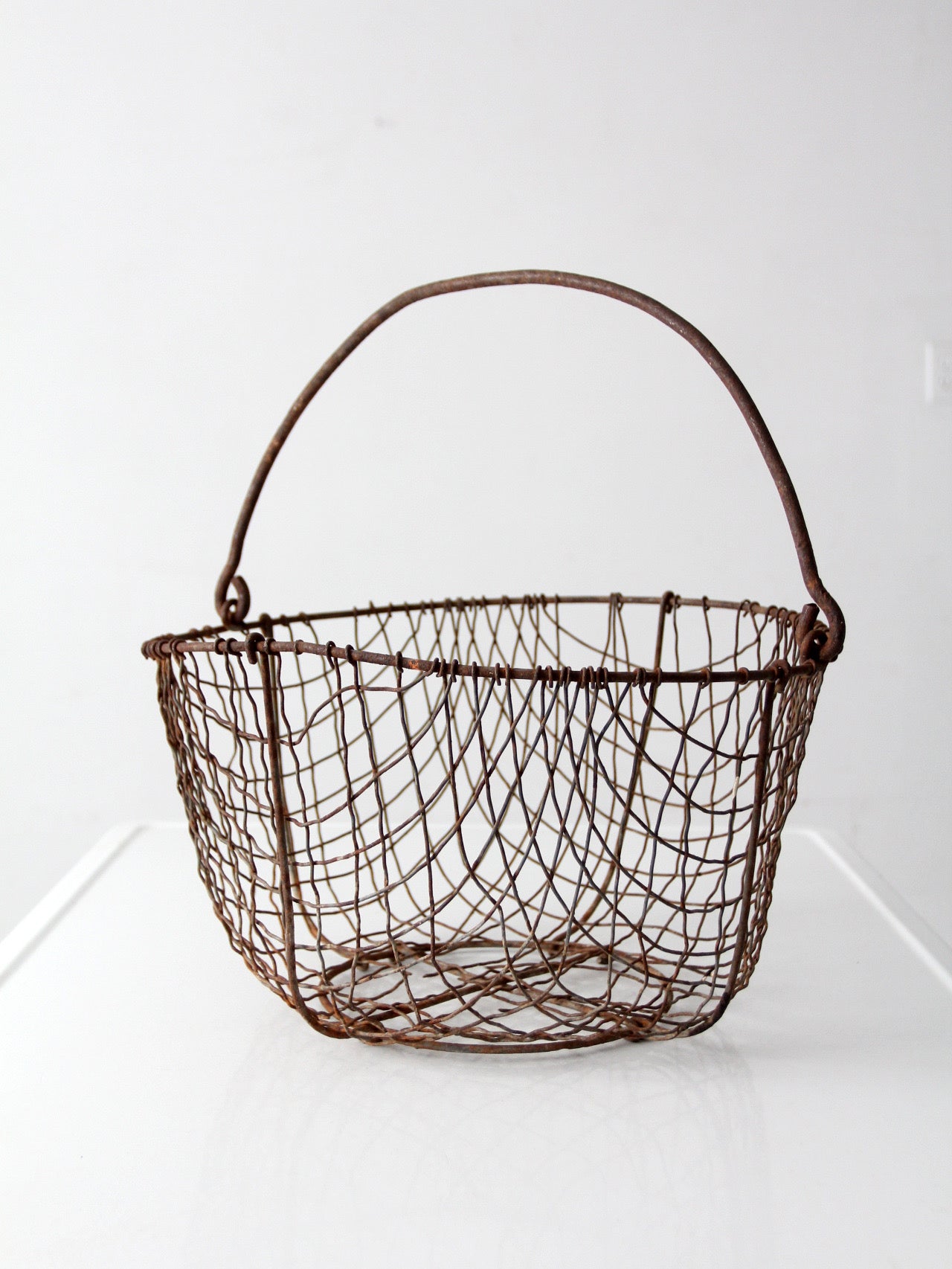antique handmade wire gathering basket
