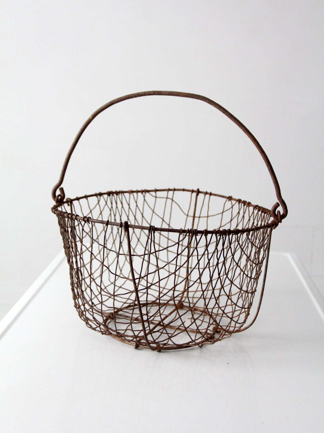 antique handmade wire gathering basket