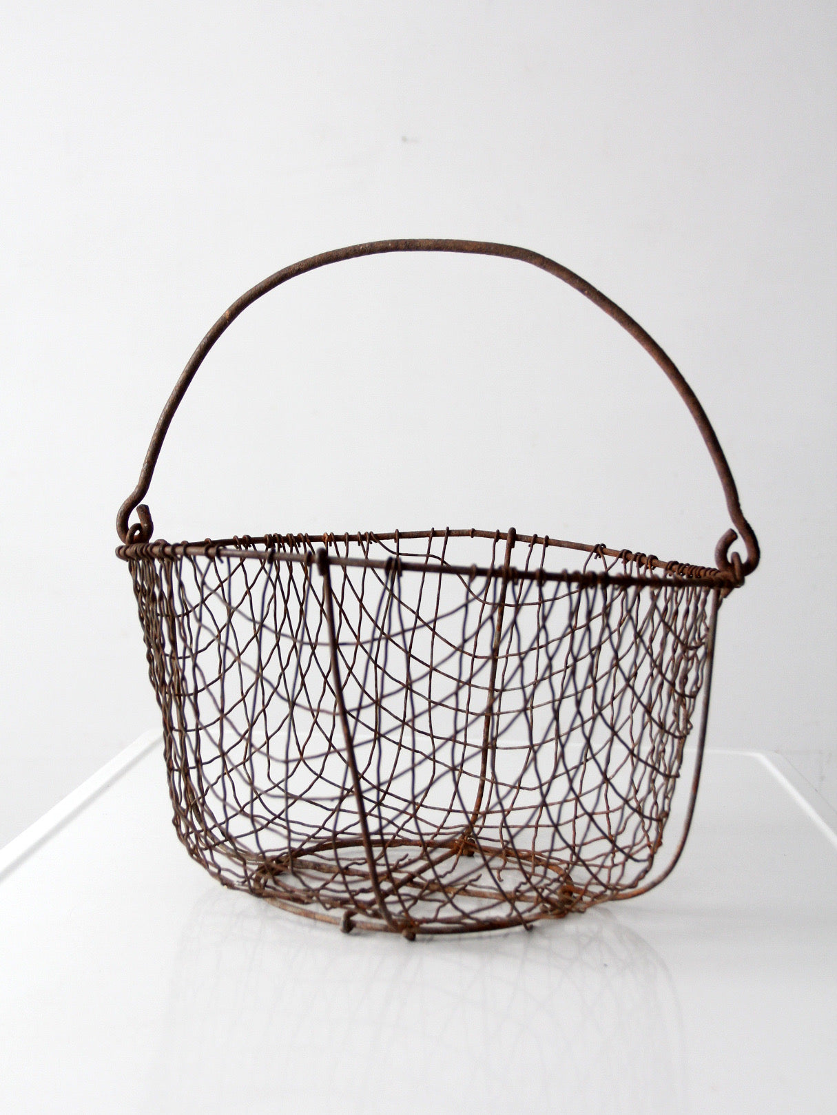antique handmade wire gathering basket