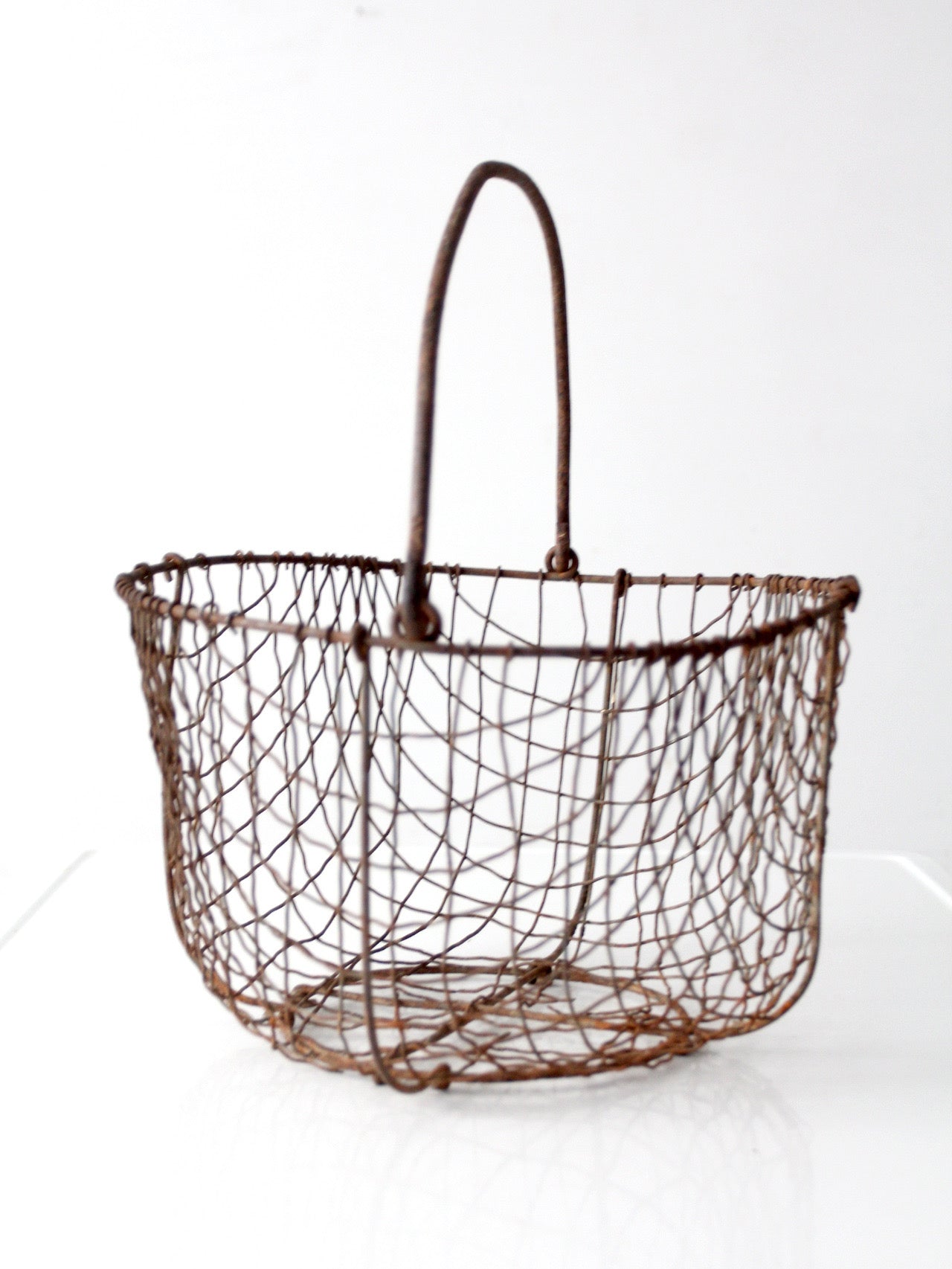 antique handmade wire gathering basket