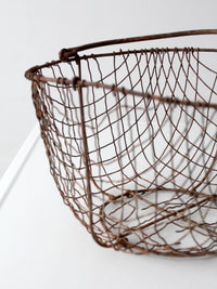antique handmade wire gathering basket