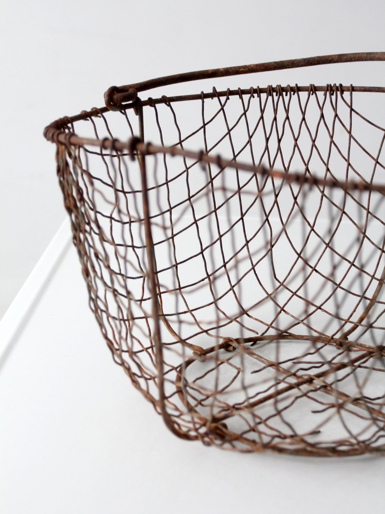 antique handmade wire gathering basket