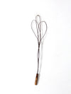 antique rug beater