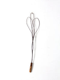 antique rug beater