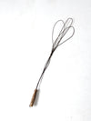 antique rug beater