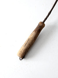 antique rug beater