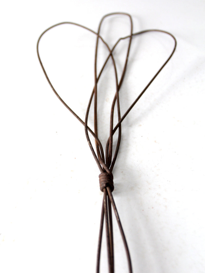 antique rug beater