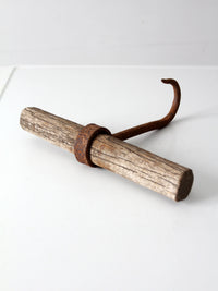 antique ice hook with wood handle
