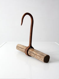 antique ice hook with wood handle